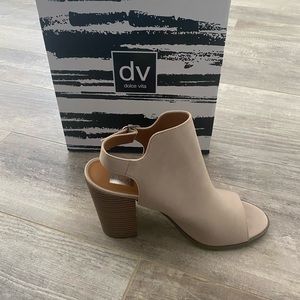 Dolce vita size 9 1/2 bone colored open toe booties.  Never worn